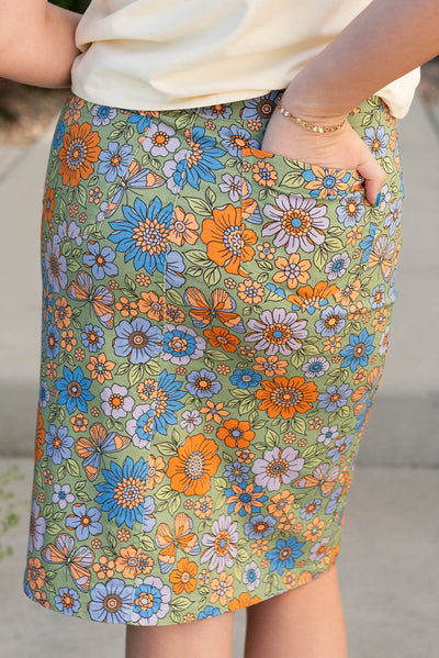 Back view of the green multi floral jean skirt 