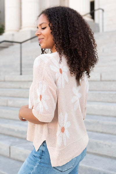 Side view of the taupe floral knit top