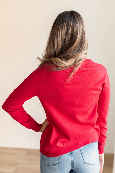 Back view of the red button down cardigan