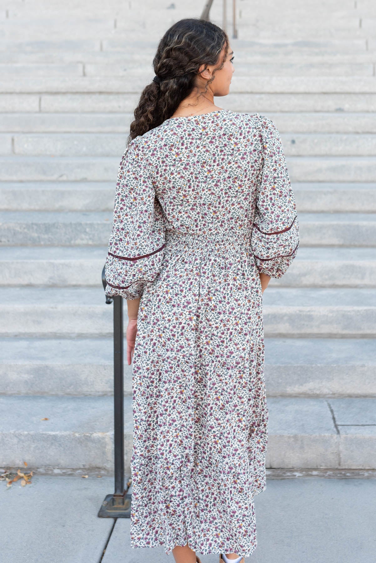 Back view of the burgundy floral dress