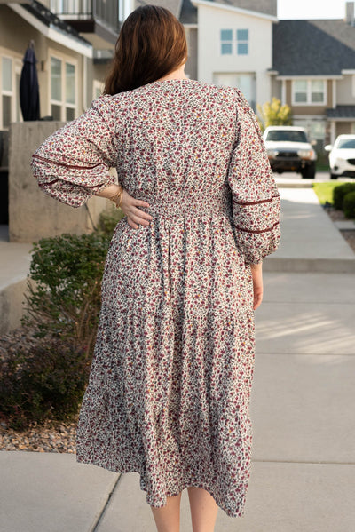 Back view of the plus size burgundy floral dress