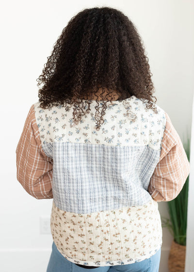 Back view of the quilted ivory pattern block jacket