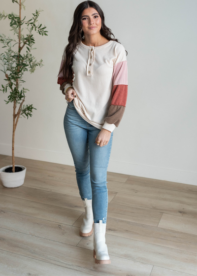 Four button cream colorblock long sleeve top