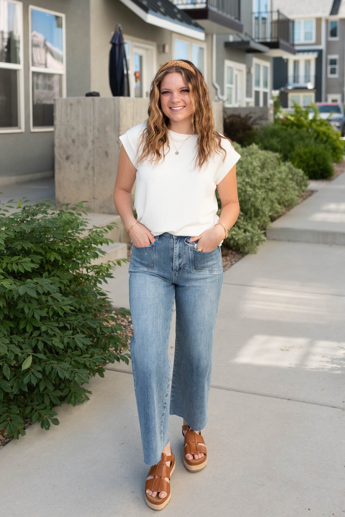 Small front pockets on the medium wash wide leg jeans