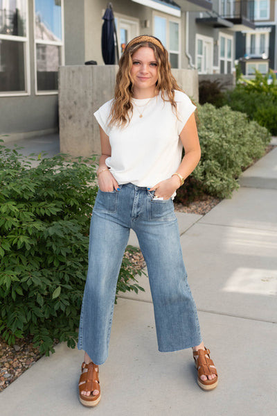 Medium wash wide leg jeans with small front pockets