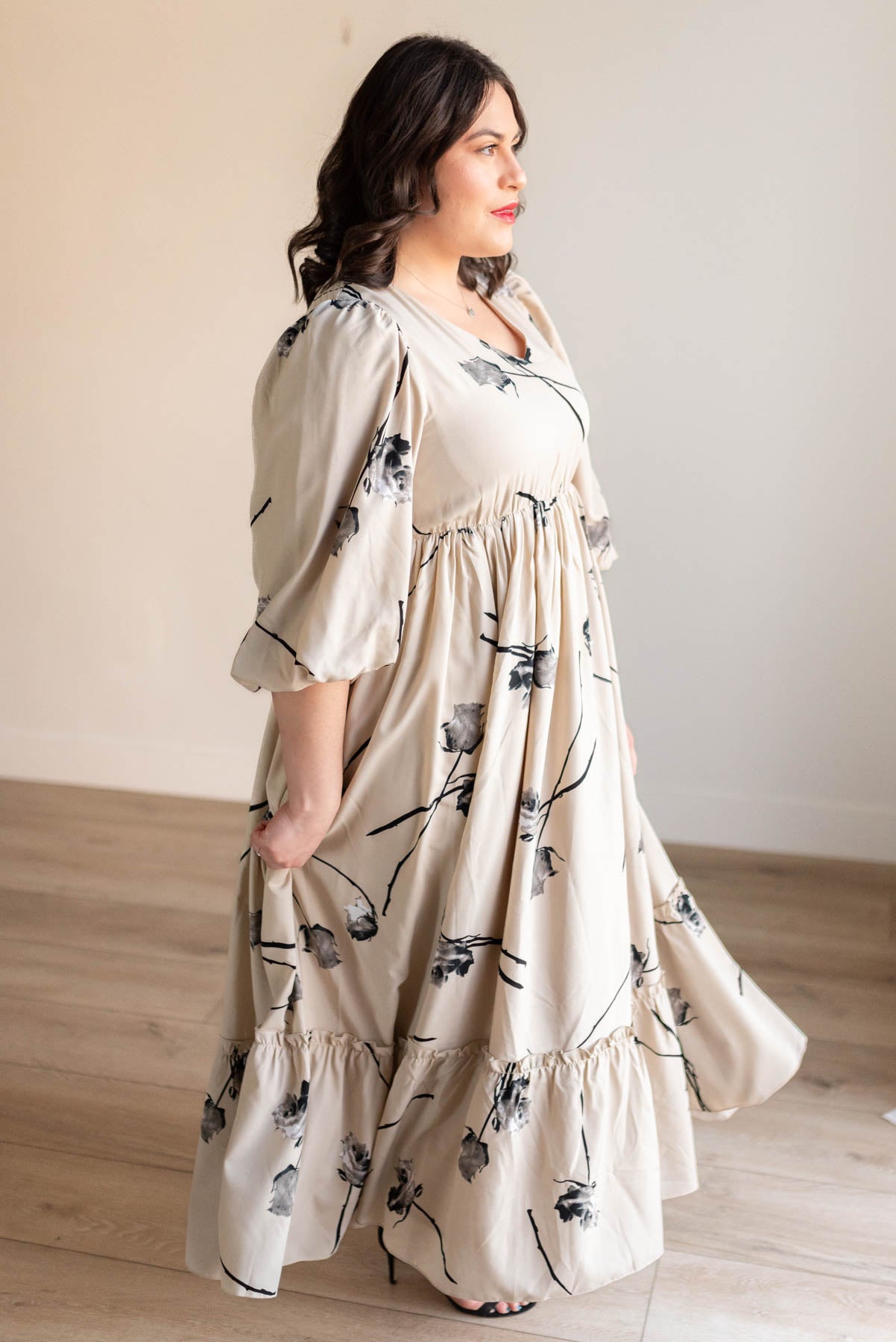 Side view of the beige floral dress in plus size