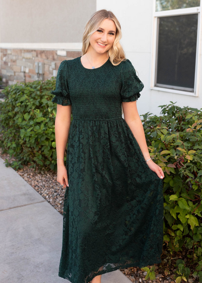 Emerald green lace dress with smocked bodice