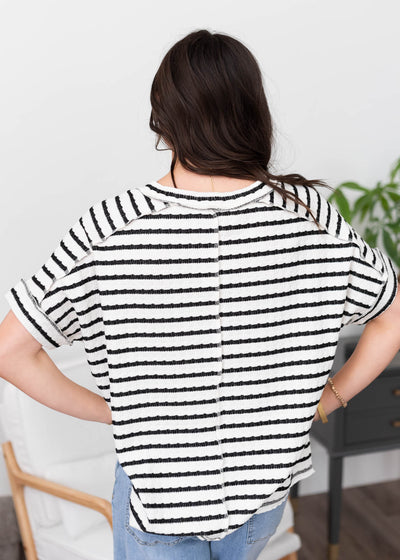 Back view of the black stripe top