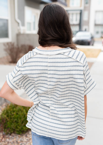 Back view of the blue grey stripe top