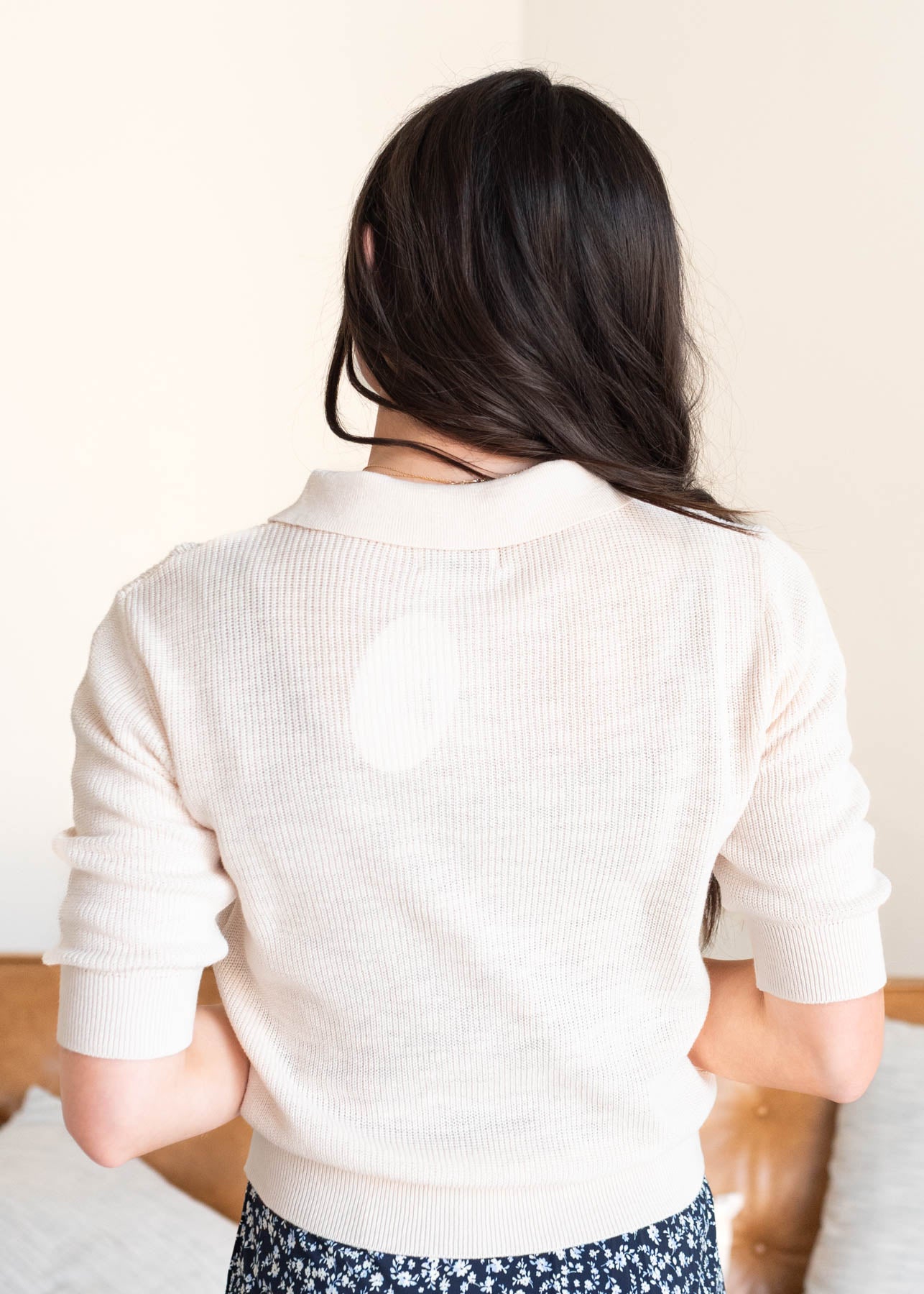 Back view of the ivory collared top