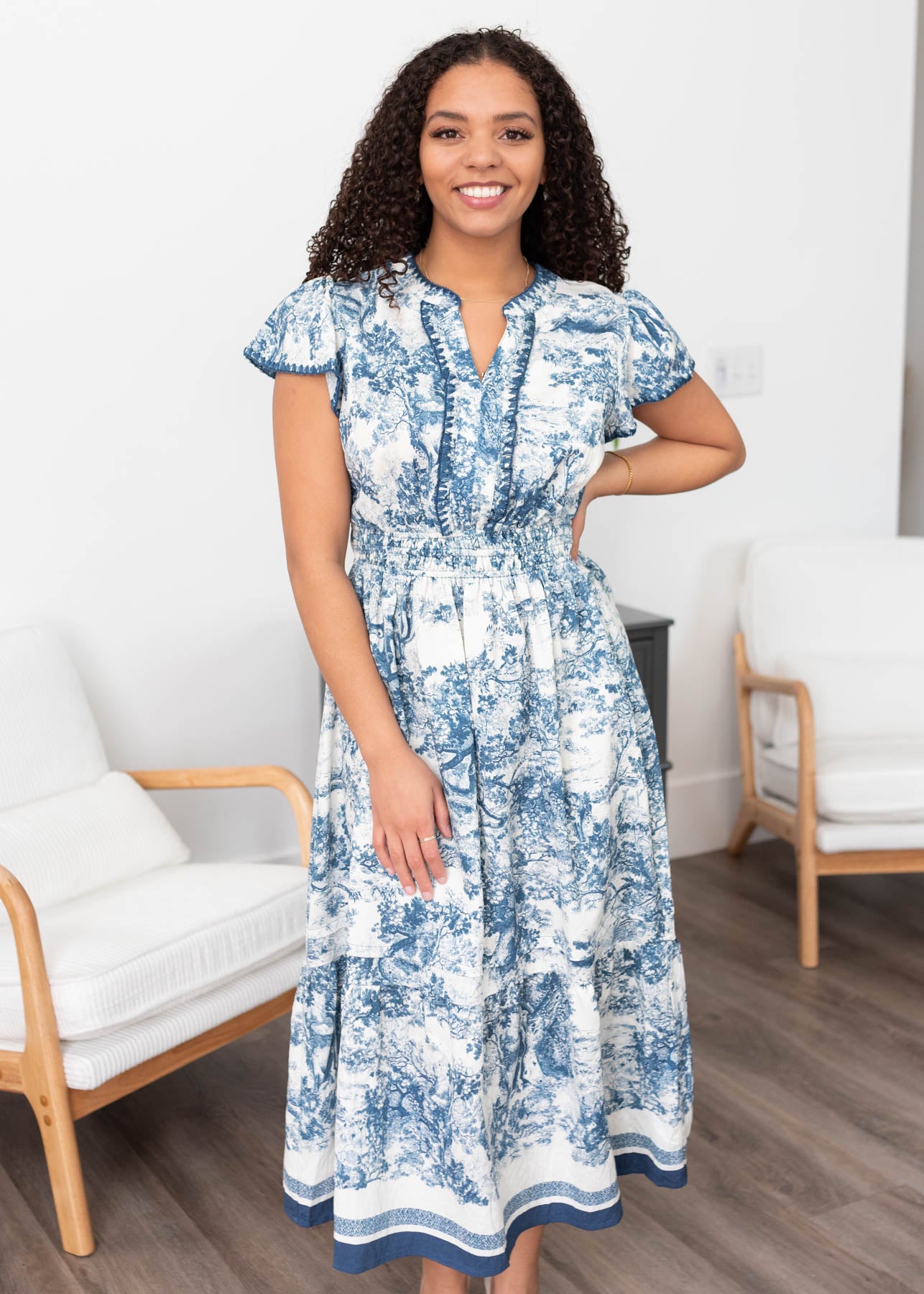 Blue pattern dress with trim on the bodice