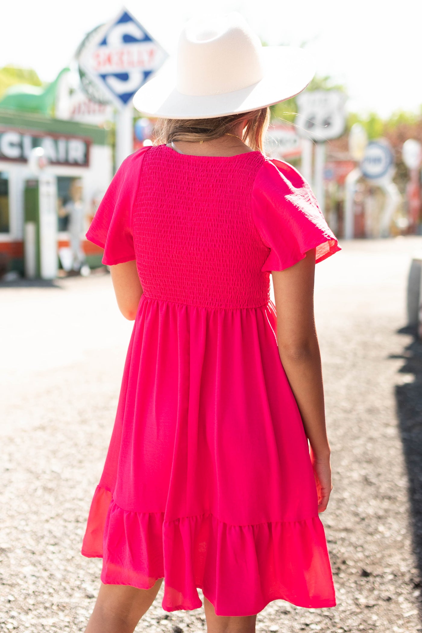 Back view of a Plus size fuchsia dress