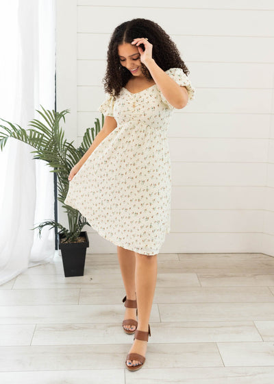 Cream floral printed dress with short sleeves