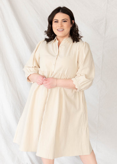 Short sleeve beige button down dress in plus size