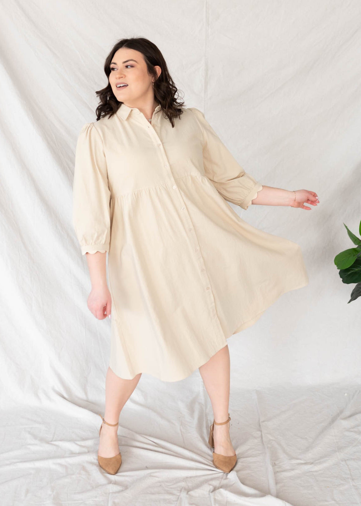 BEige button down dress with short sleeves