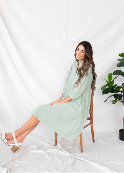 Side view of the sage button down dress