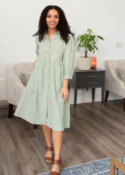 Sage button down dress with three quater sleeves