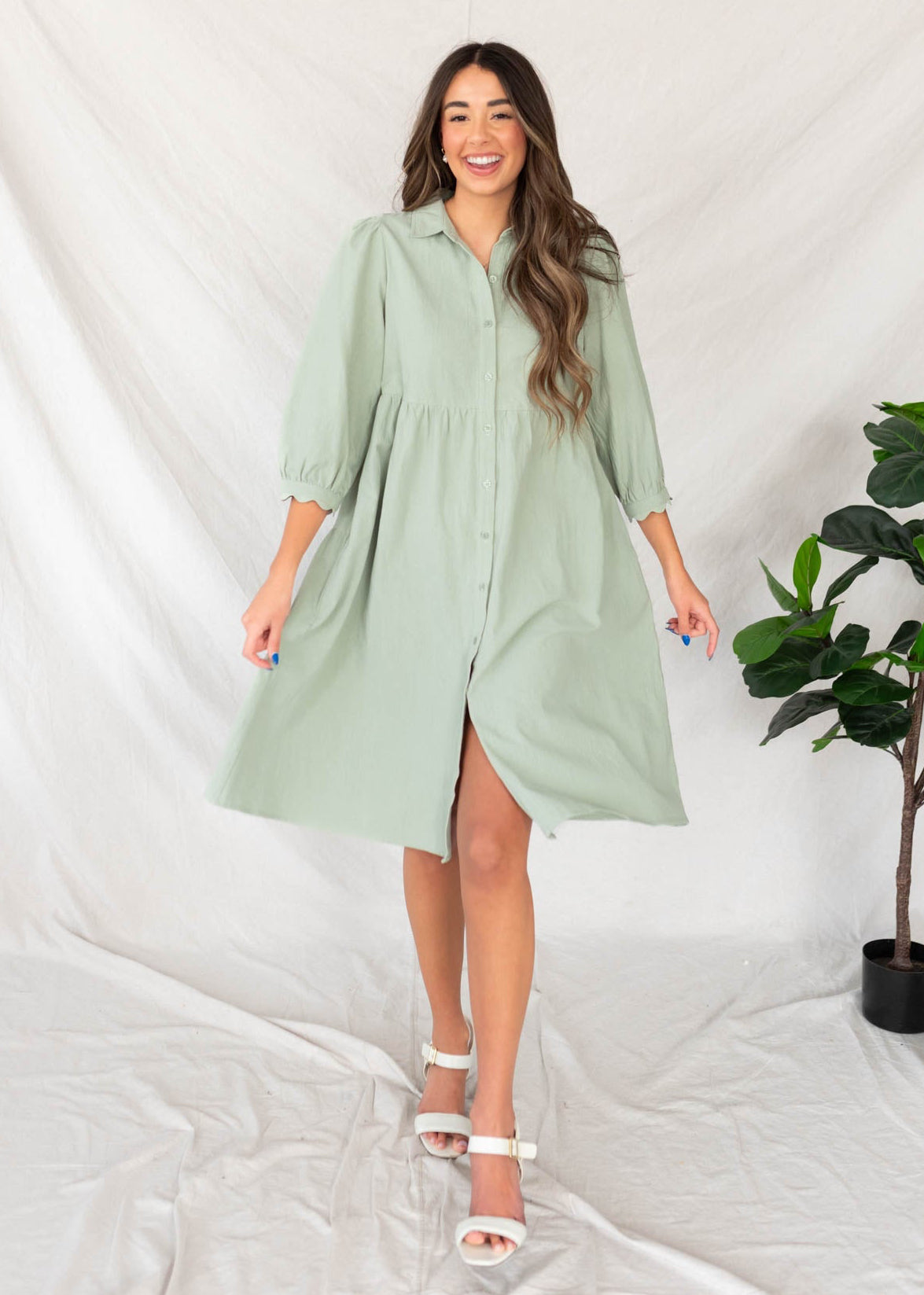 Small sage button down dress with a collar