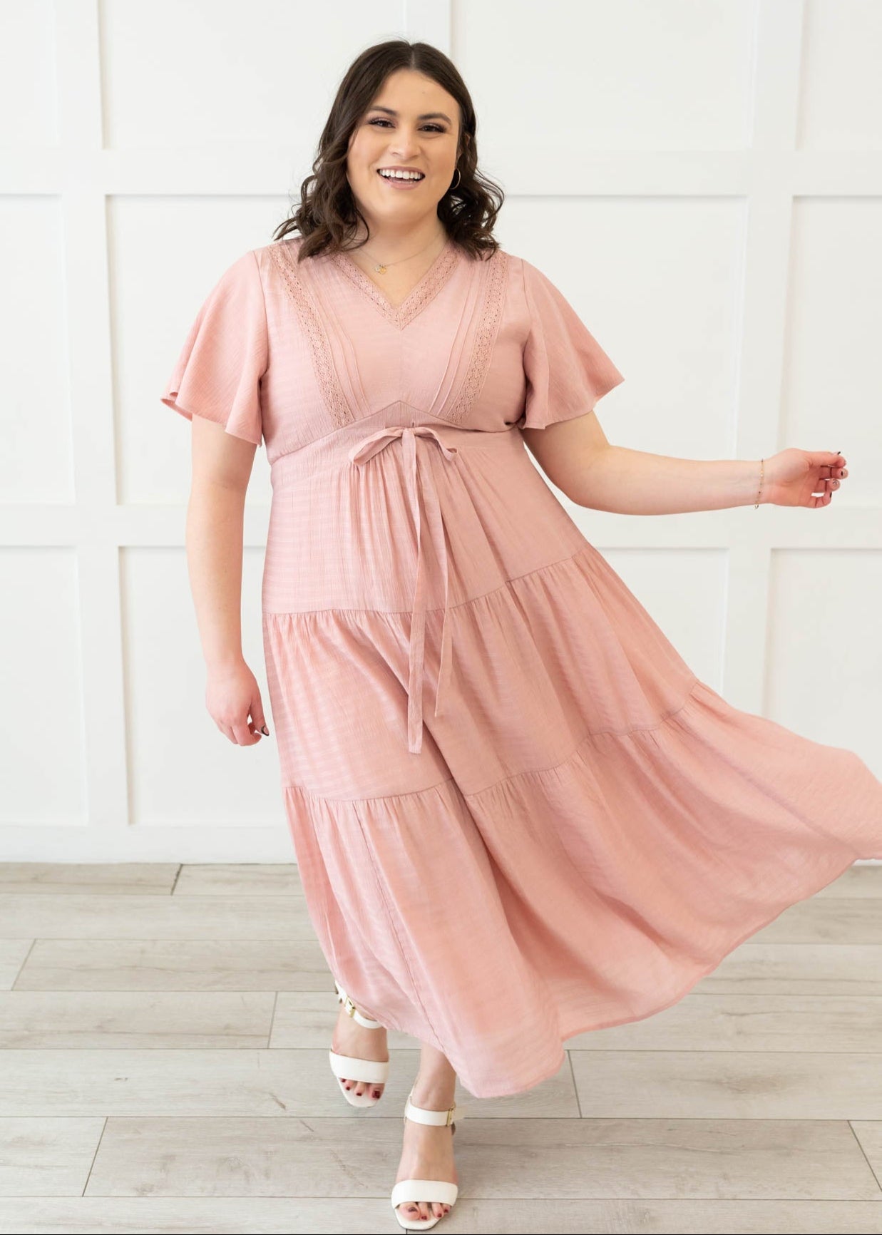 Plus size blush textured tiered dress with lace tirm and short sleeves