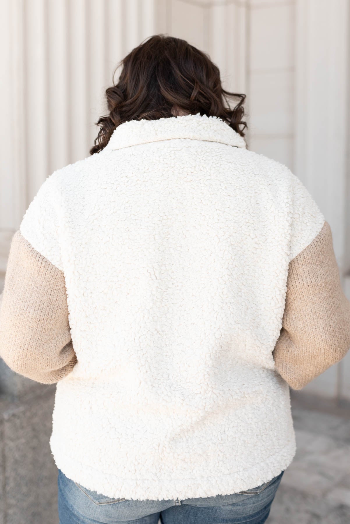 Back view of the plus size taupe fur sueded jacket