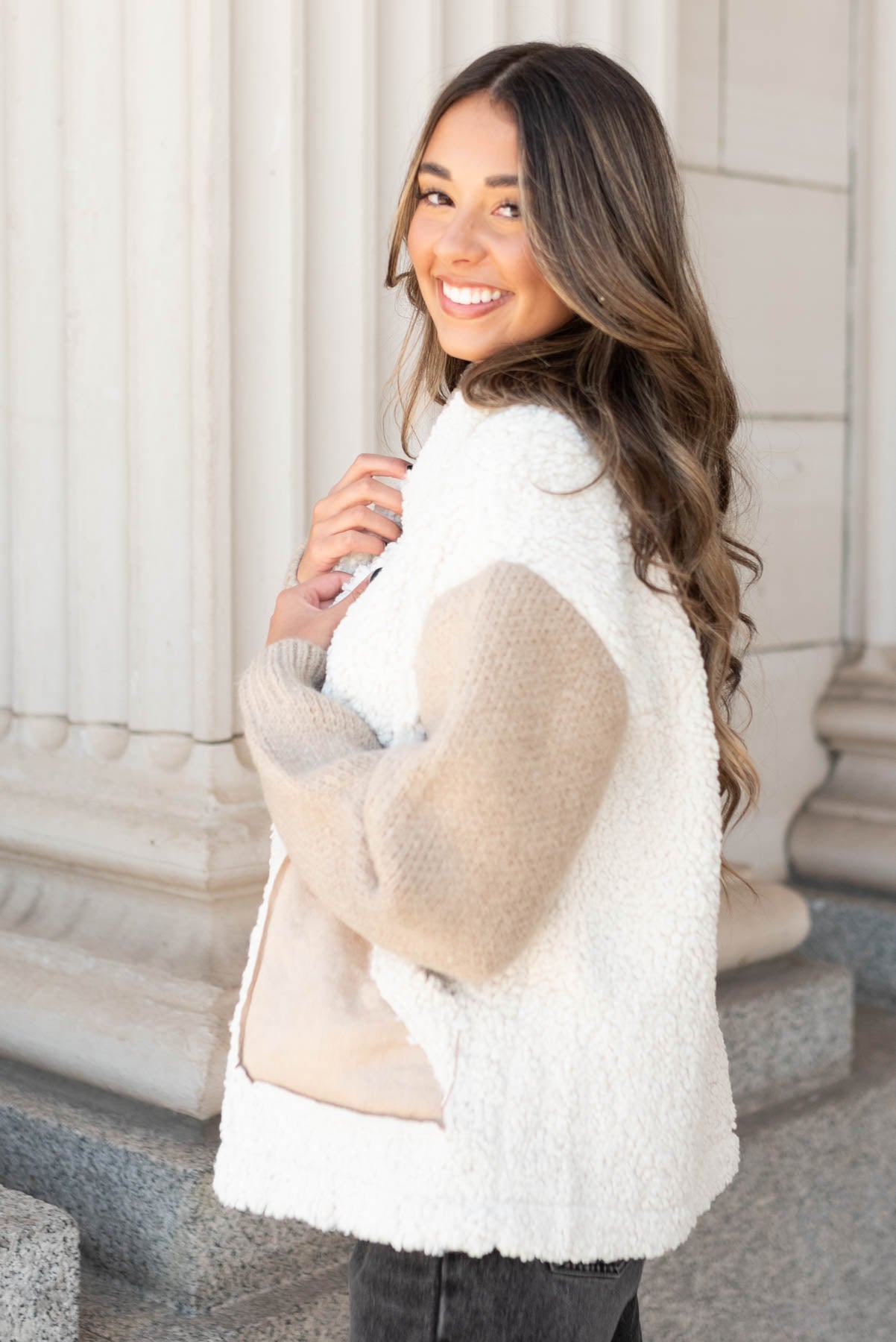 Side view of the taupe fur sueded jacket