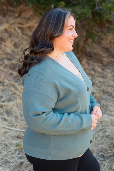 Side view of the plus size jade buttondown cardigan