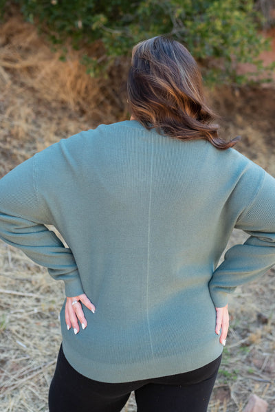 Back view of the jade buttondown cardigan in plus size