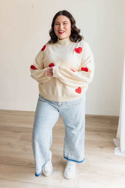 Long sleeve red heart cream sweater in plus size