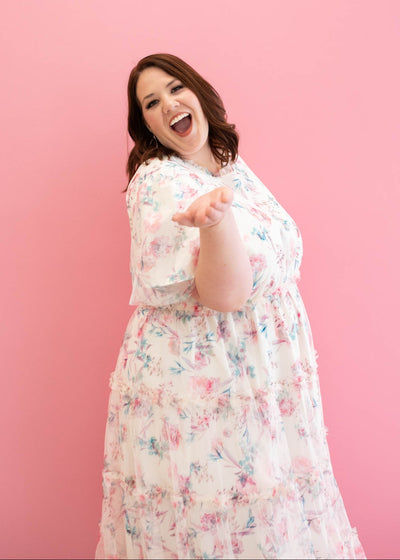 Side view of the plus size pink floral mesh dress