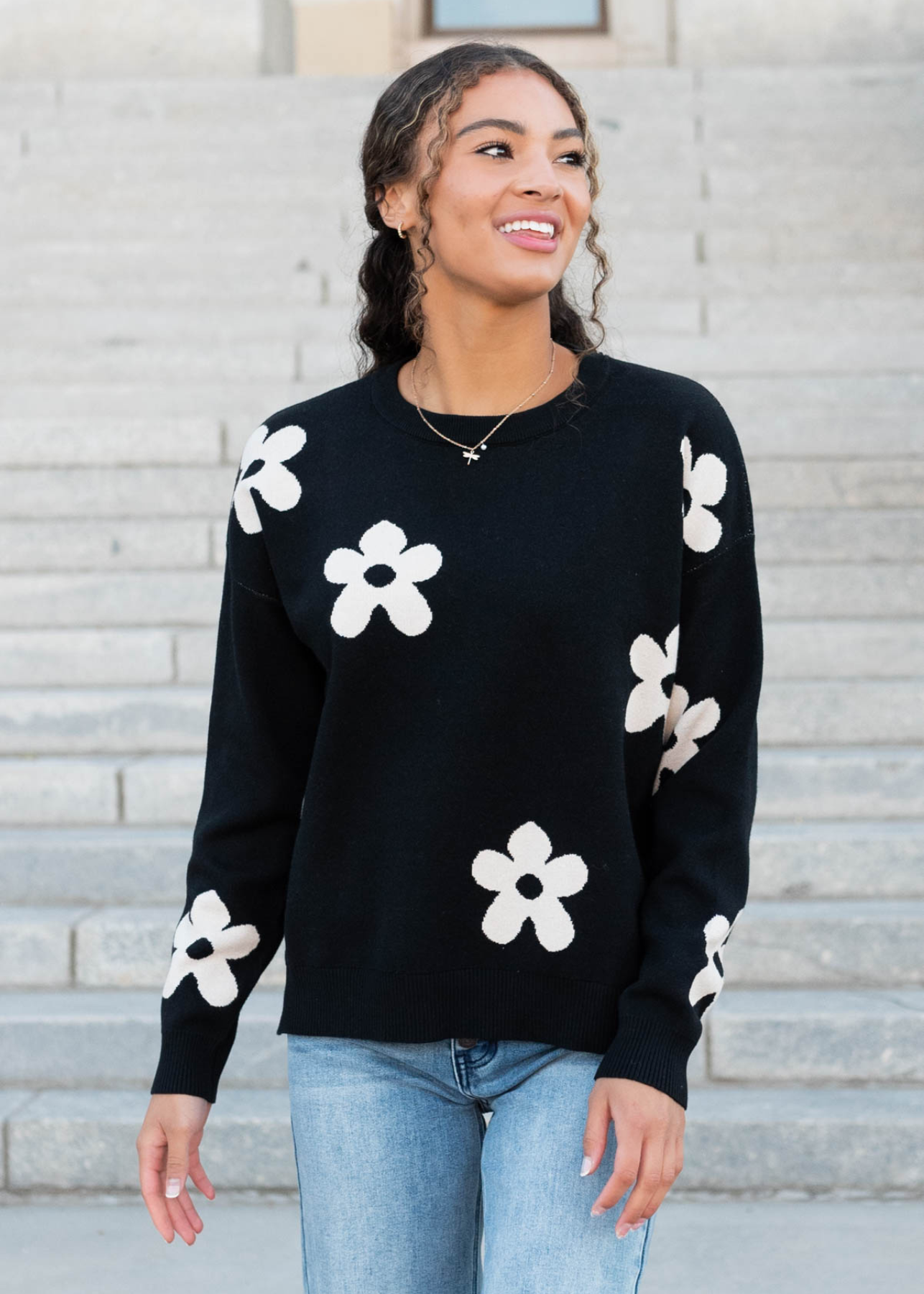 Black floral sweater with long sleeves