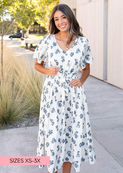 Blue floral dress with a tie at the waist