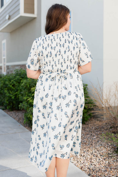 Back view of the plus size blue flroal dress