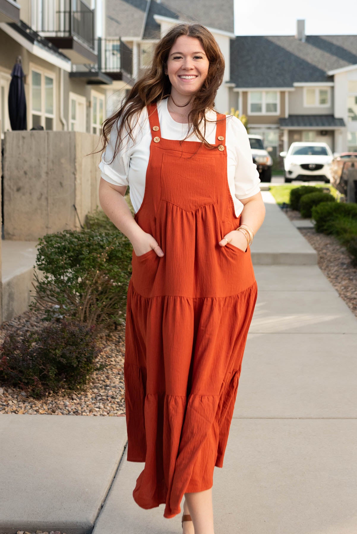 Plus size rust overall dress with adjustable button straps