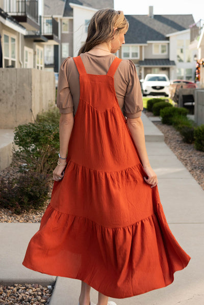 Back view of the rust overall dress