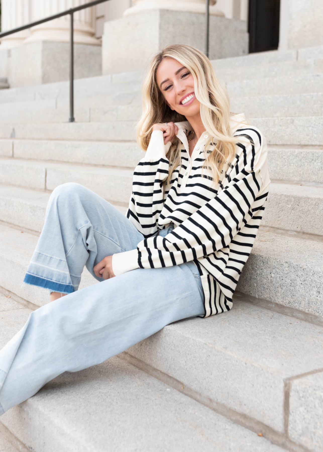 Black stripe pullover top with a collar