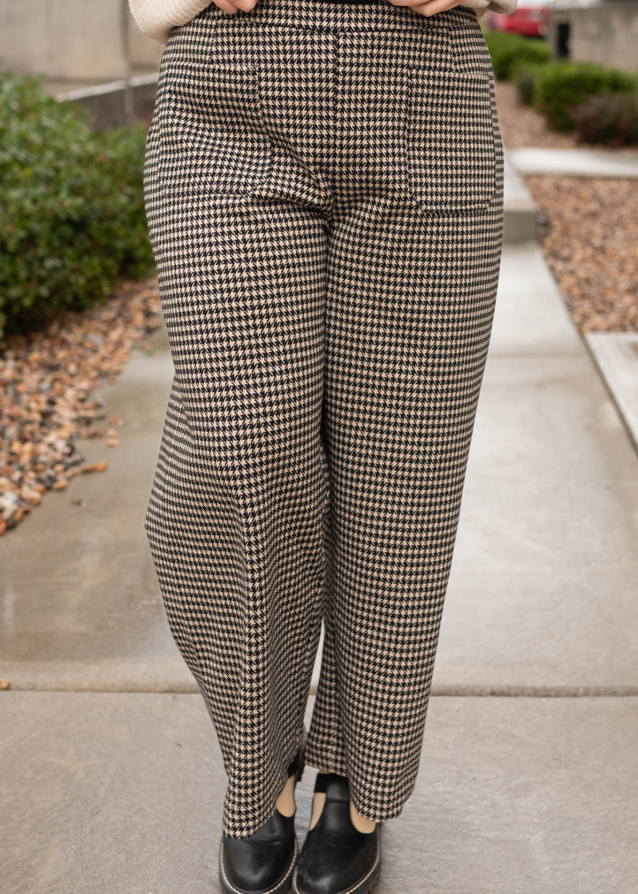 Close up of the plus size black houndstooth pants in plus size