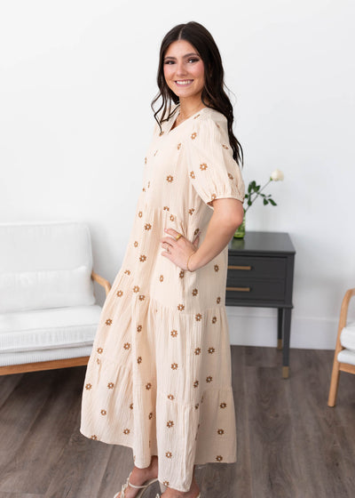 Side view of the cream embroidered dress