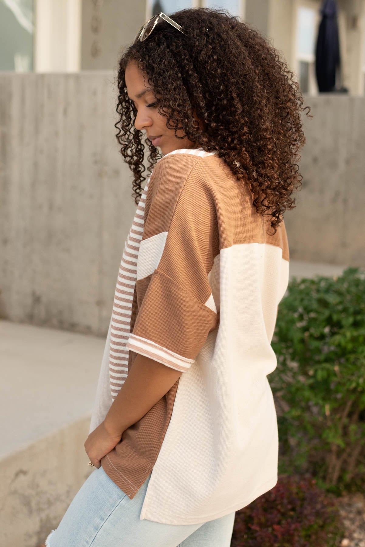 Side view of the tan mixed pattern top