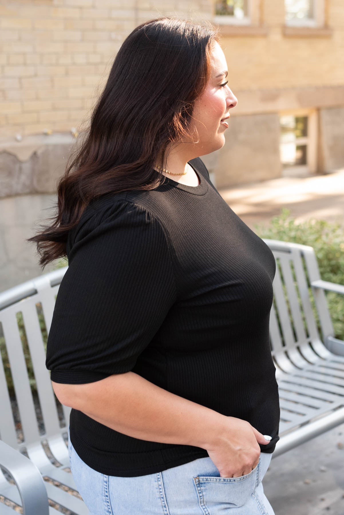 Side view of the plus size 3x basic black top