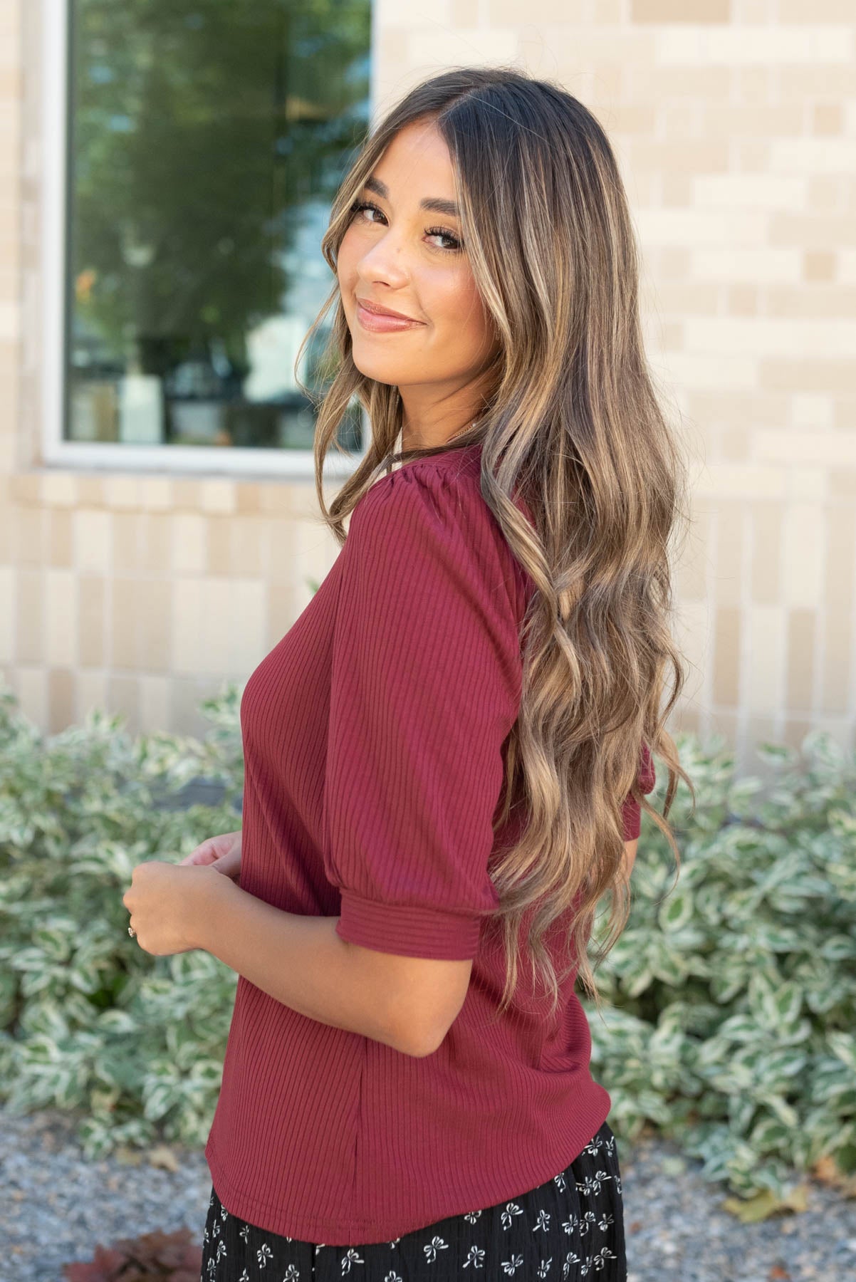 Side view of the basic burgundy top