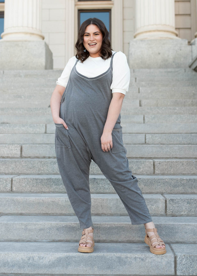 Basic white top under a plus size charcoal jumpsuit