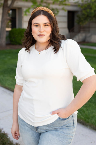 Front view of the plus size basic white top