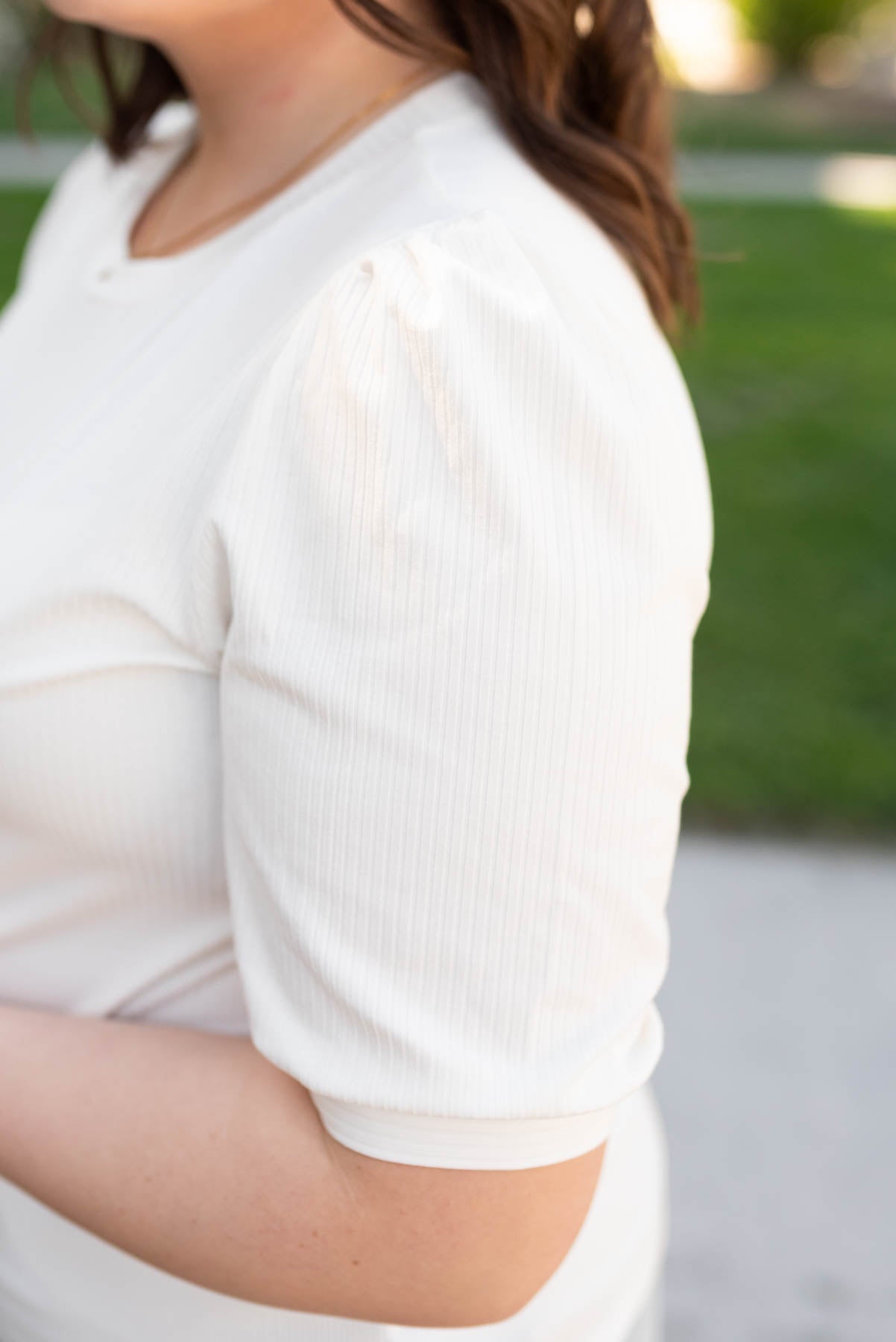 Close up of the plus size basic white top