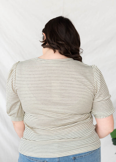 Back view of the plus size ivory striped top