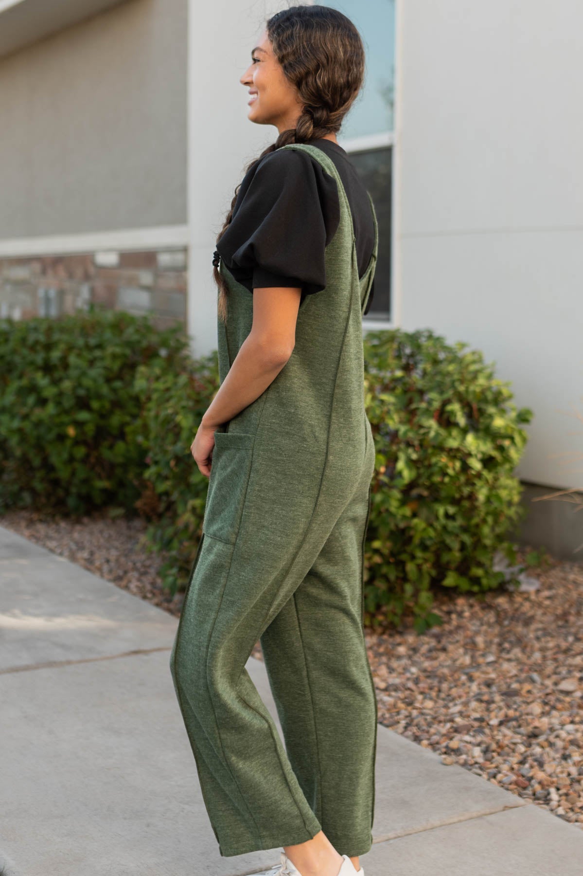 Side view of the olive overalls