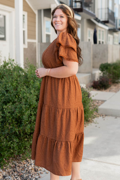 Side view of the plus size chestnut ruffle tiered dress