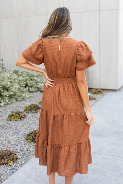 Back view of the chestnut ruffle tiered dress