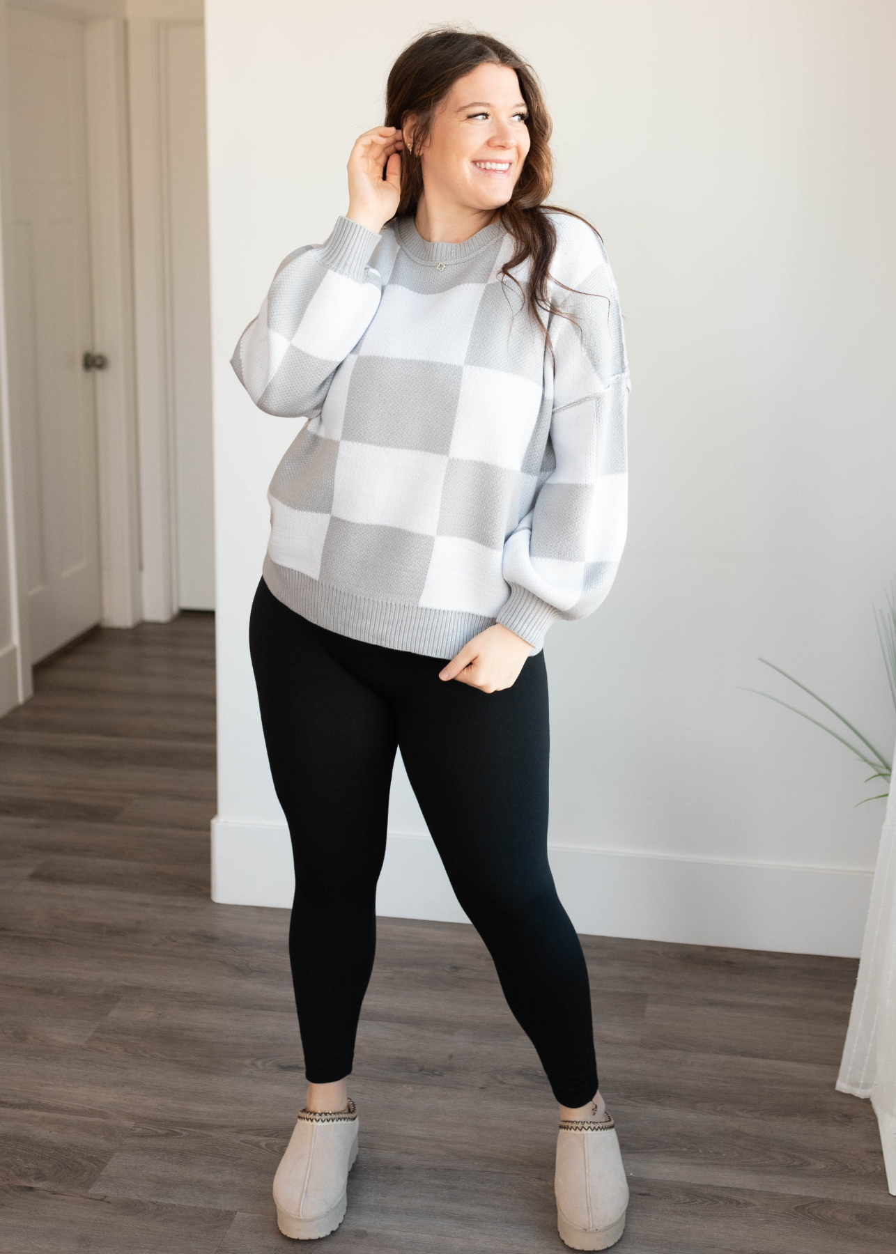 Plus size white and gray checkered sweater