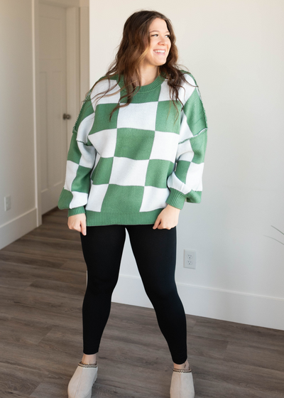 Green checkered sweater with long sleeves