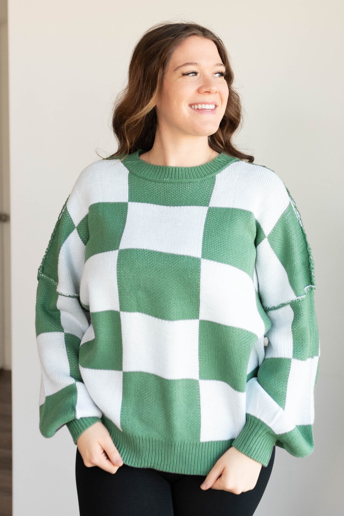 Drop sleeve green checkered sweater in plus size